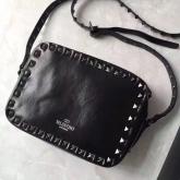 Valentino Garavani Rockstud Rolling Noir Cross Body Bag With Craquele Effect. CY00768